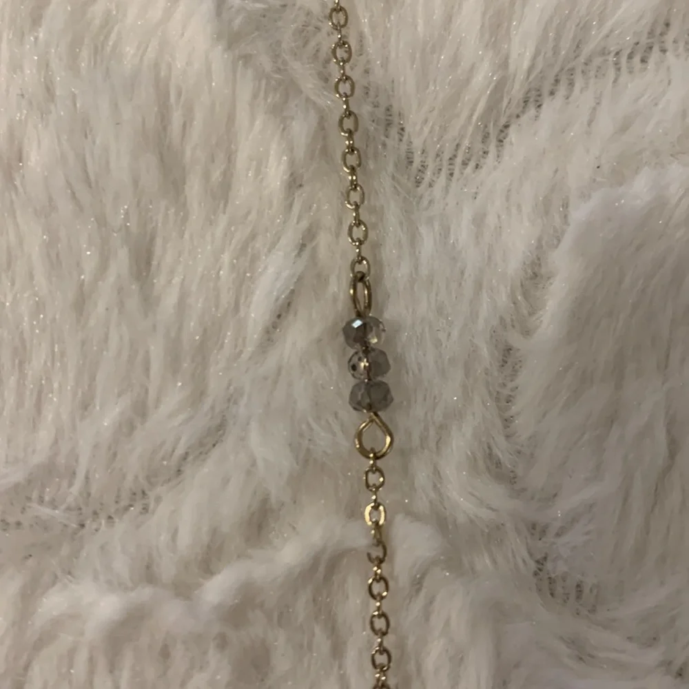 Disc‎ pendant necklace with some little beads on chain.Beautiful and sparkly.